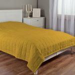 Dekoria.pl, narzuta pikowana w kratę uszyta z tkaniny z kolekcji Etna