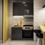 Biale-tlo-aranzacyjne-pozwala-wyeksponowac-zolte-i-szare-elementy-wyposazenia.-Na-zdjeciu-kuchnia-Flinton.-Fot.-RuckZuck